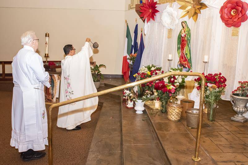 CHARLOTTE ¬— Masses for the Feast of Our Lady of Guadalupe were celebrated at St. Gabriel Church in Charlotte by Father Fidel Melo and Father Frank O’Rourke. (Photo by Jose Sanchez)