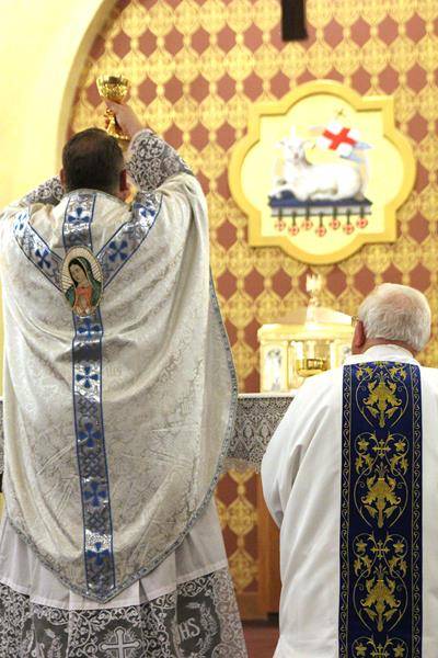 MONROE — Parishioners at Our Lady of Lourdes Church celebrated the feast of Our Lady of Guadalupe Dec. 12 with singing, traditional dances and a Mass that evening offered by Father Benjamin Roberts, pastor. (Photos by SueAnn Howell | Catholic News Herald)