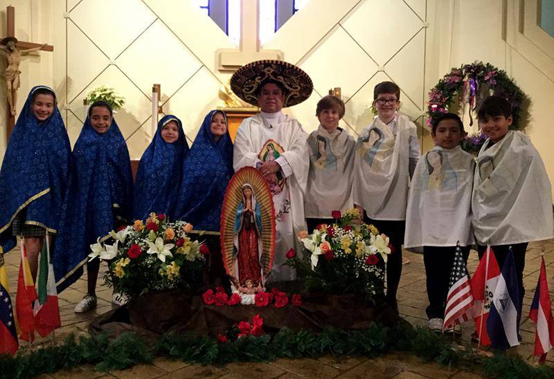 CHARLOTTE — St. Gabriel School has a tradition – now in its 13th year – of celebrating Our Lady of Guadalupe on her feast day Dec. 12 with a school Mass. The students read, responded and sung in English and in Spanish. (Photo provided by Addy Mullis)