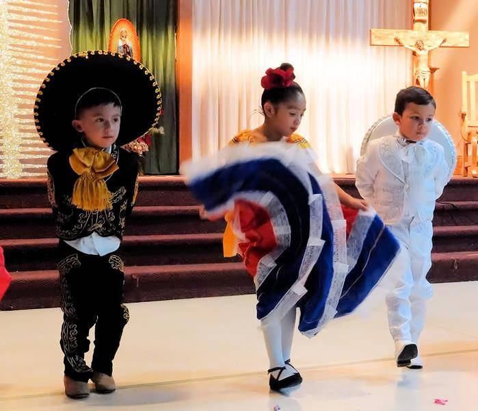 HUNTERSVILLE — Parishioners and students at St. Mark Church and School got into the festive spirit with several celebrations for the Feast of Our Lady of Guadalupe