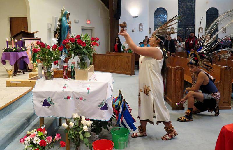 Afterwards refreshments were served in the social hall. Mass was celebrated at 6 p.m., followed by a procession and then a wonderful fiesta in the social hall. (Photo provided by Connie Ries)