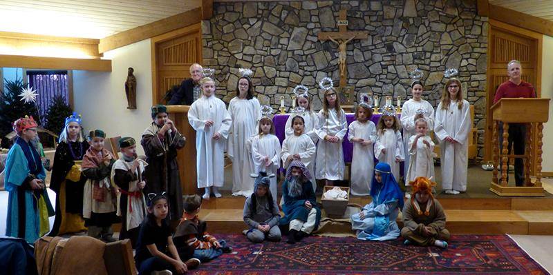 BOONE — The choir of St. Elizabeth Church hosted an Advent Lessons and Carols Dec. 2. As part of the evening program, children in the parish’s faith formation program presented their yearly Nativity drama. (Amber Mellon | Catholic News Herald)