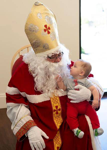 Families were invited to bring their baby Jesus figurines from their home Nativity sets for a very special blessing, given at Mass by Monsignor Anthony Marcaccio. (Photos provided by Lindsay Kohl and MaryAnn Luedtke)