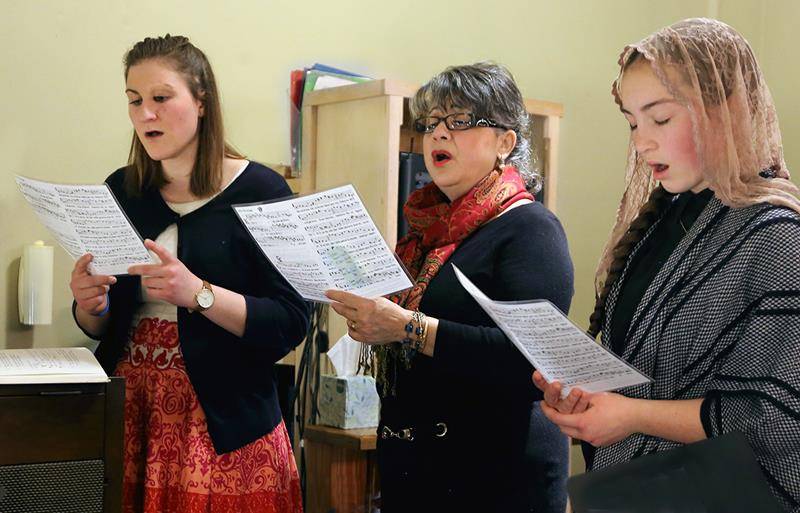 The sacred music was comprised of voice with string and woodwind instruments. At the 6:30 p.m. Mass, music was provided by Diane Nelson, Lily Nelson and Cailin Bennett, vocalists pictured, with Susan Hartley on recorder. (Giuliana Polinari Riley | Cathol