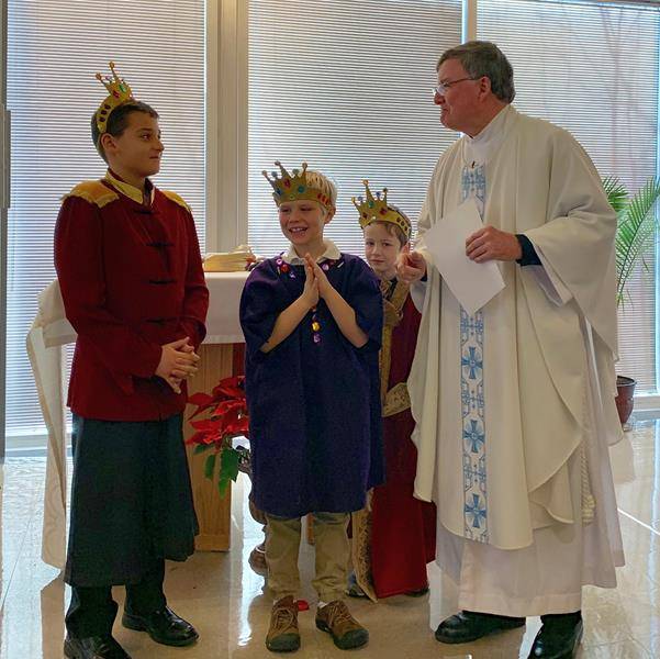 St. Peter parishioners enjoyed a Family Mass Epiphany celebration last weekend. Children who performed in the parish's Christmas pageant joined Father Jim Shea, pastor, for part of his homily. (Photo provided by Cathy Chiappetta)