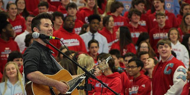 CHARLOTTE — PJ Anderson, a nationally-known Catholic speaker and singer-songwriter, brought his message of inspiration and faith to Charlotte Catholic High School students. He played a mixture of popular music, Christian rock, and gospel songs. (Photo pro