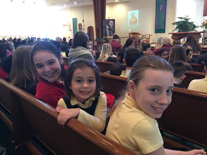 Students at Immaculate Heart of Mary School celebrated a student-lead Mass during Catholic Schools Week. Students sat with their prayer partners during Mass. (Photo via Facebook)