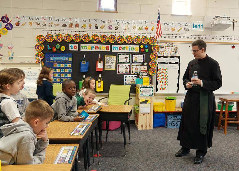 HUNTERSVILLE —St. Mark School’s students celebrated Faith Appreciation Day during Catholic Schools Week with Mass and heard from many speakers. (Photos provided by Amy Burger)