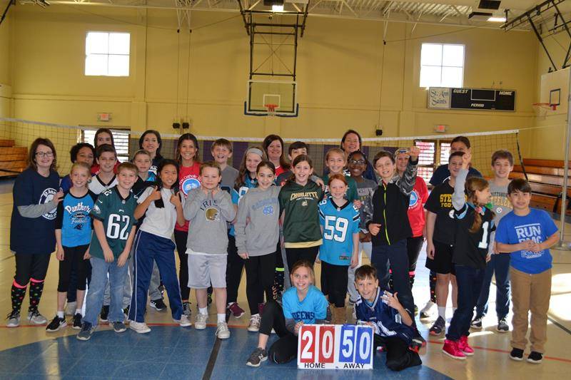 CHARLOTTE — St. Ann School started Catholic Schools Week with a prayer service on Jan. 28. The annual teachers vs. Fifth Grade students volleyball game followed. Teachers won the first game and students won the second. (Photo via Facebook)