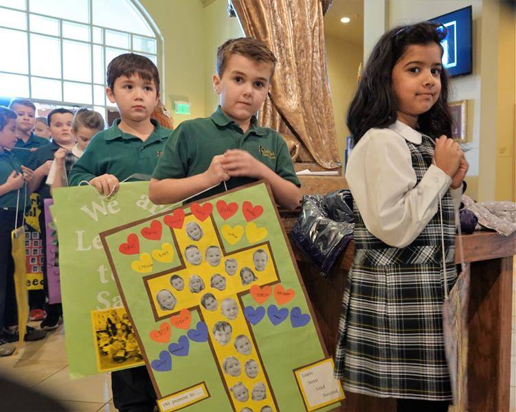 HUNTERSVILLE —St. Mark School’s students celebrated Faith Appreciation Day during Catholic Schools Week with Mass and heard from many speakers. (Photos provided by Amy Burger)