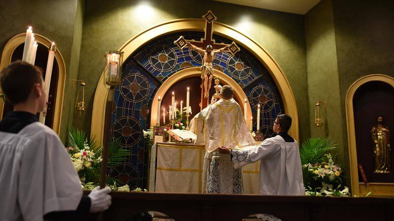 A Latin Mass was offered at Easter at Charlotte Catholic High School. (Photo by Markus Kuncoro)