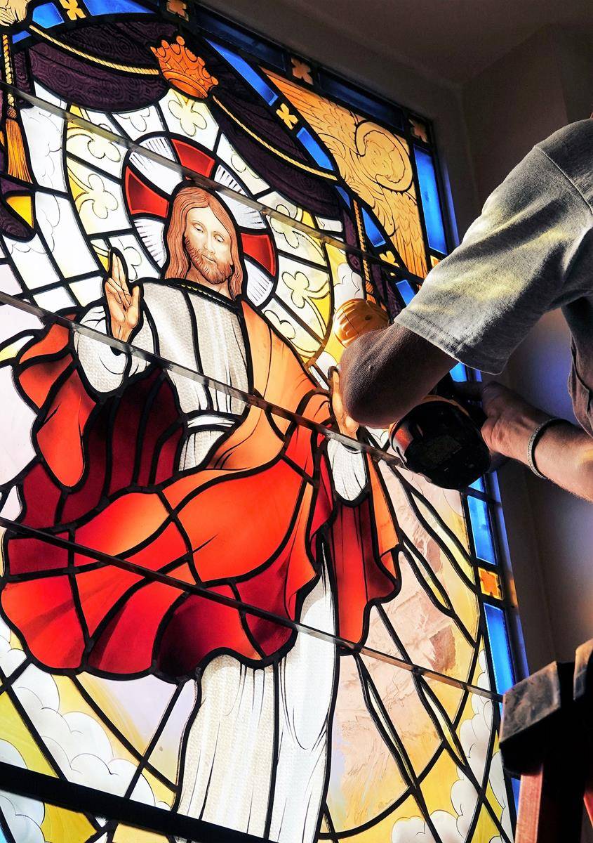 St. Mark stained glass Christ Ascension window being installed.