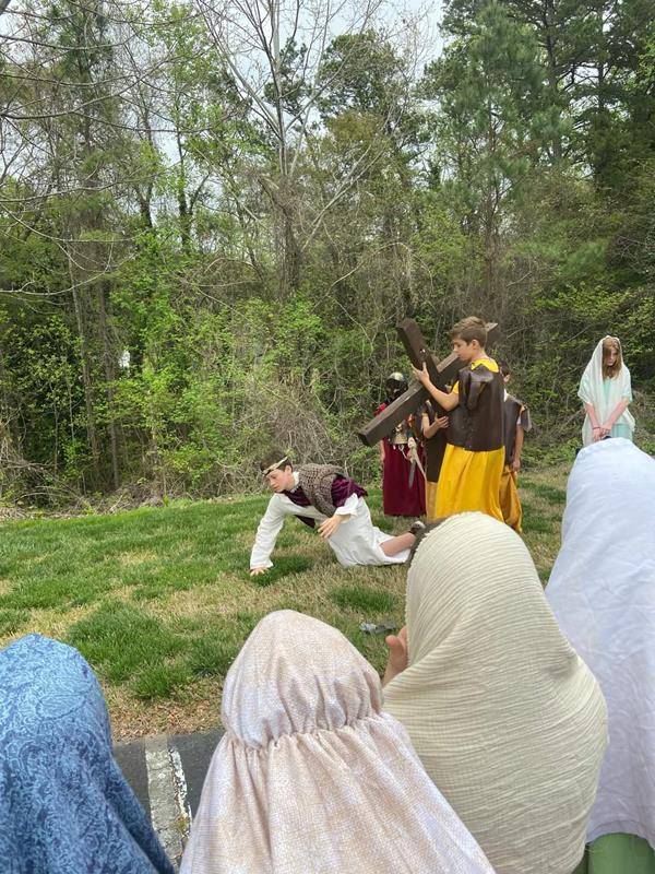 St. Michael School third and sixth grade classes performed a Living Stations of the Cross. (Photo via Facebook)