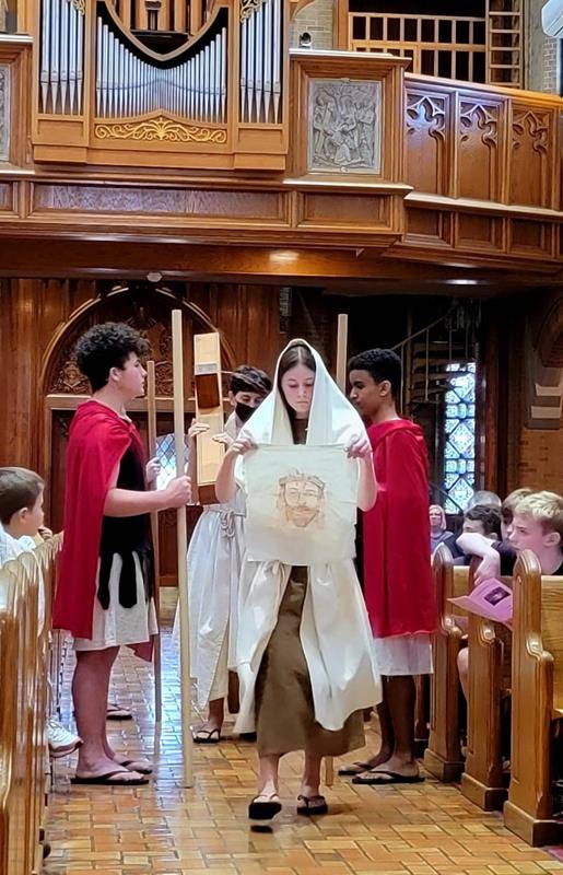 Our Lady of Grace School seventh grade students presented the Living Stations of the Cross for the school and parish community. (Photo via Facebook)