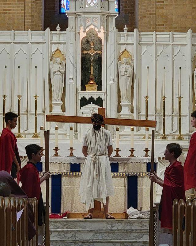 Our Lady of Grace School seventh grade students presented the Living Stations of the Cross for the school and parish community. (Photo via Facebook)