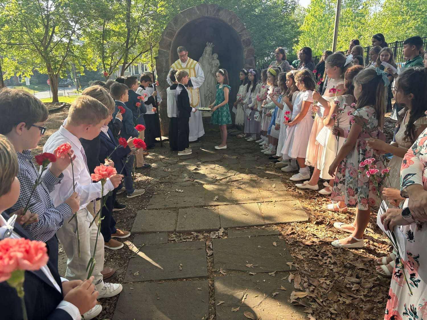 St. Patrick students were joined by their families during school Mass May 7 to celebrate Mary.